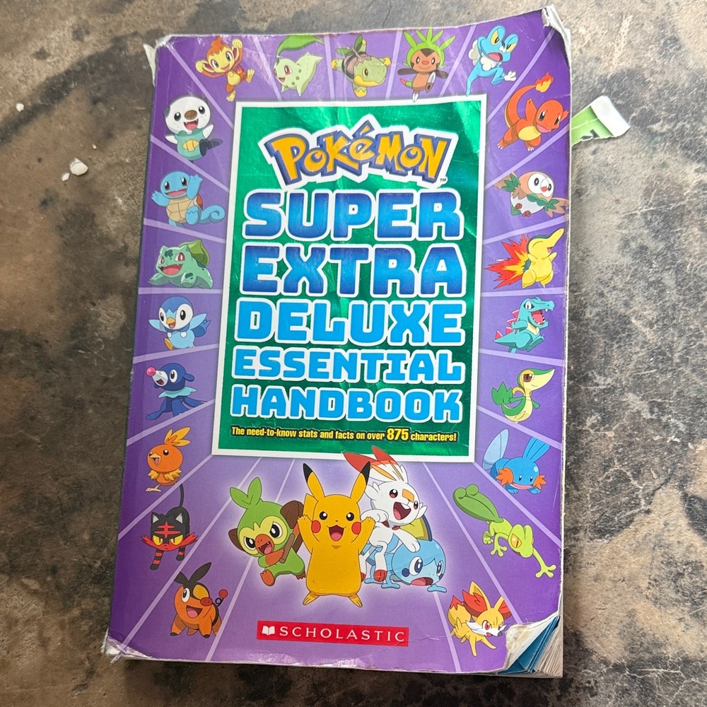 Pokémon Super Extra Deluxe Essential Handbook - Purple Pikachu Cover
